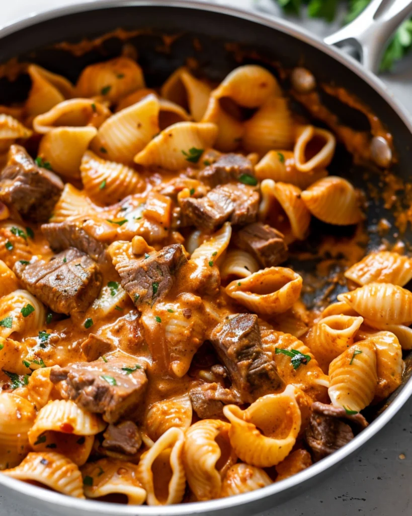 Creamy Paprika Steak Shells – 5 Proven Flavorful Steps 4 creamy paprika sauce in skillet with pasta shells