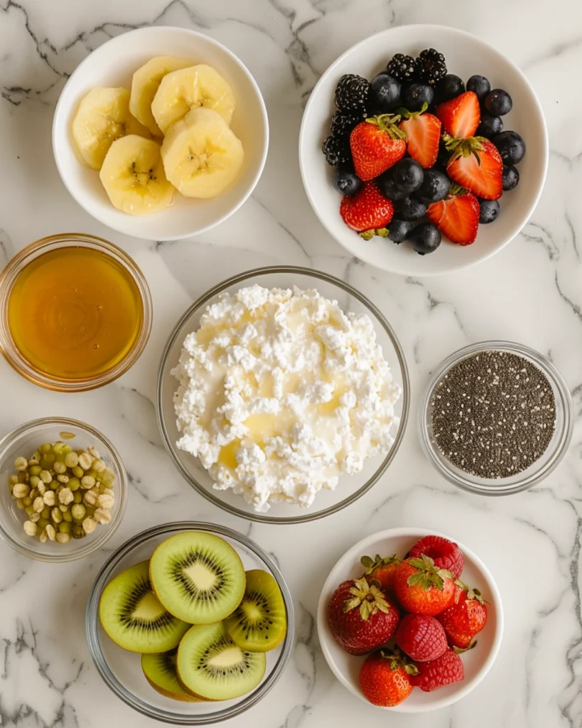 Cottage Cheese Fruit Bowl: 5 Refreshing Ways to Build a Healthy Breakfast 2 Ingredients for Cottage Cheese Fruit Bowl on marble counter