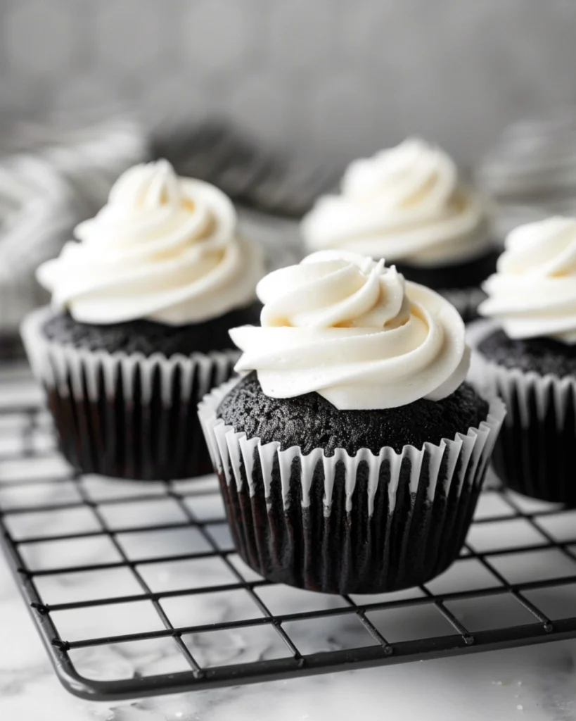 Ghostly Cupcakes: 5 Easy Steps to the Ultimate Halloween Treat 3 Baked vanilla cupcakes cooling before frosting