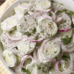 Creamy cucumber salad with dill and onions