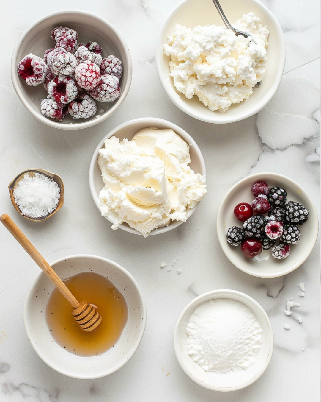 Ingredients for Cottage Cheese Ice Cream on marble counter
