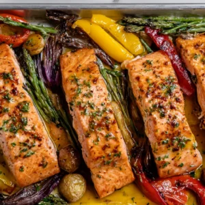 Cowboy butter salmon sheet pan with roasted vegetables
