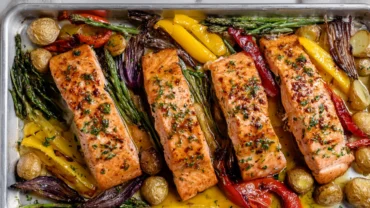 Cowboy butter salmon sheet pan with roasted vegetables