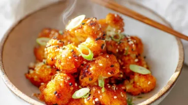 Crispy Bang Bang Cauliflower in a modern cozy kitchen