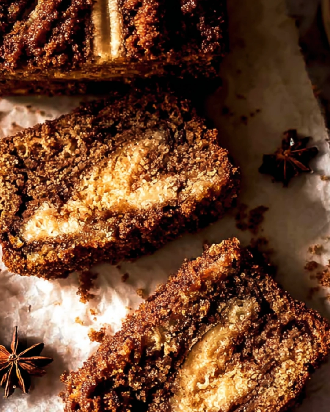 slices of cinnamon swirl banana bread showing caramelized sugar crust and soft banana crumb