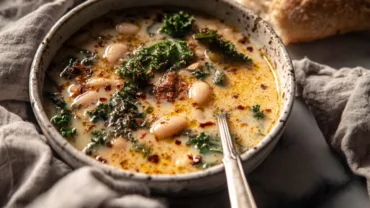 Creamy Tuscan White Bean Soup in a cozy modern kitchen