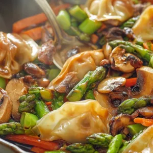 Potsticker stir fry with crispy dumplings, mushrooms, and vegetables in soy-vinegar glaze