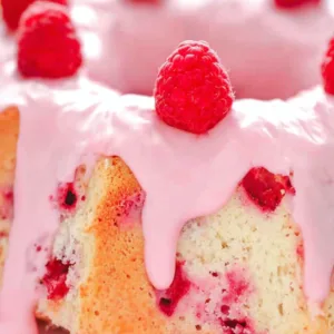 Raspberry Angel Food Cake with lemon raspberry glaze