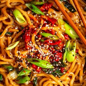 Spicy noodles recipe in rustic bowl