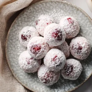 Cherry snowball cookies with powdered sugar