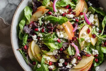 Honeycrisp Apple & Feta Salad in a wooden bowl