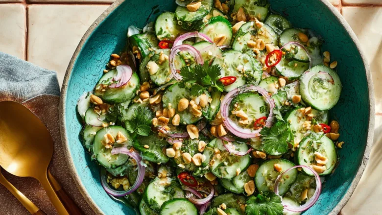 Thai cucumber salad with peanuts, chili, and red onion