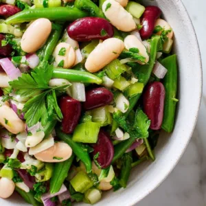 Three Bean Salad with green, kidney, and white beans in tangy vinaigrette