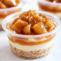 Delicious Apple Dessert Cups with caramel, cinnamon, and creamy layers.