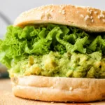 Chickpea Avocado Dill Pickle Sandwich with fresh herbs and crunch