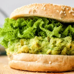 Chickpea Avocado Dill Pickle Sandwich with fresh herbs and crunch