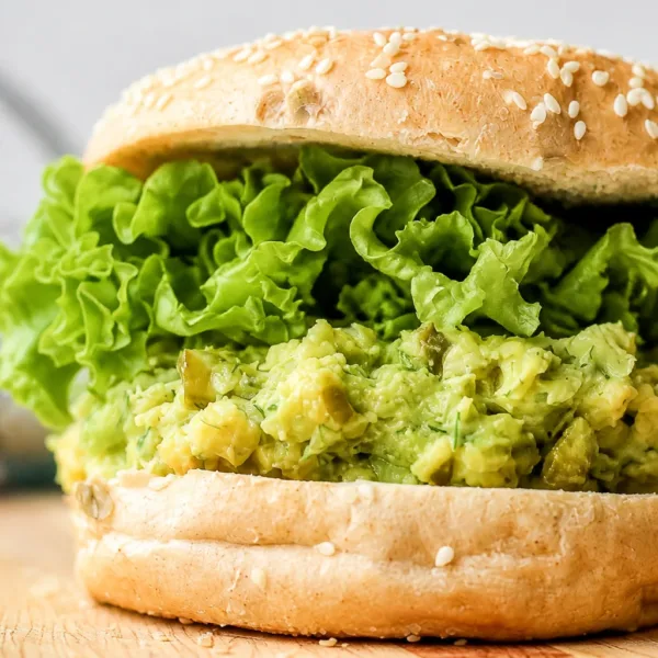Chickpea Avocado Dill Pickle Sandwich with fresh herbs and crunch