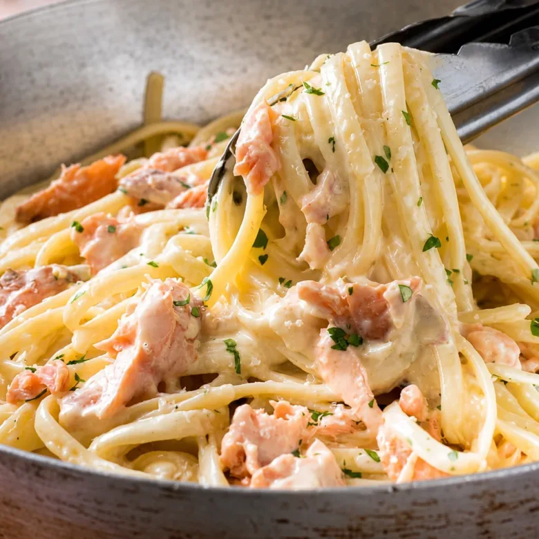 Creamy hot smoked salmon pasta with lemon and dill in a bowl