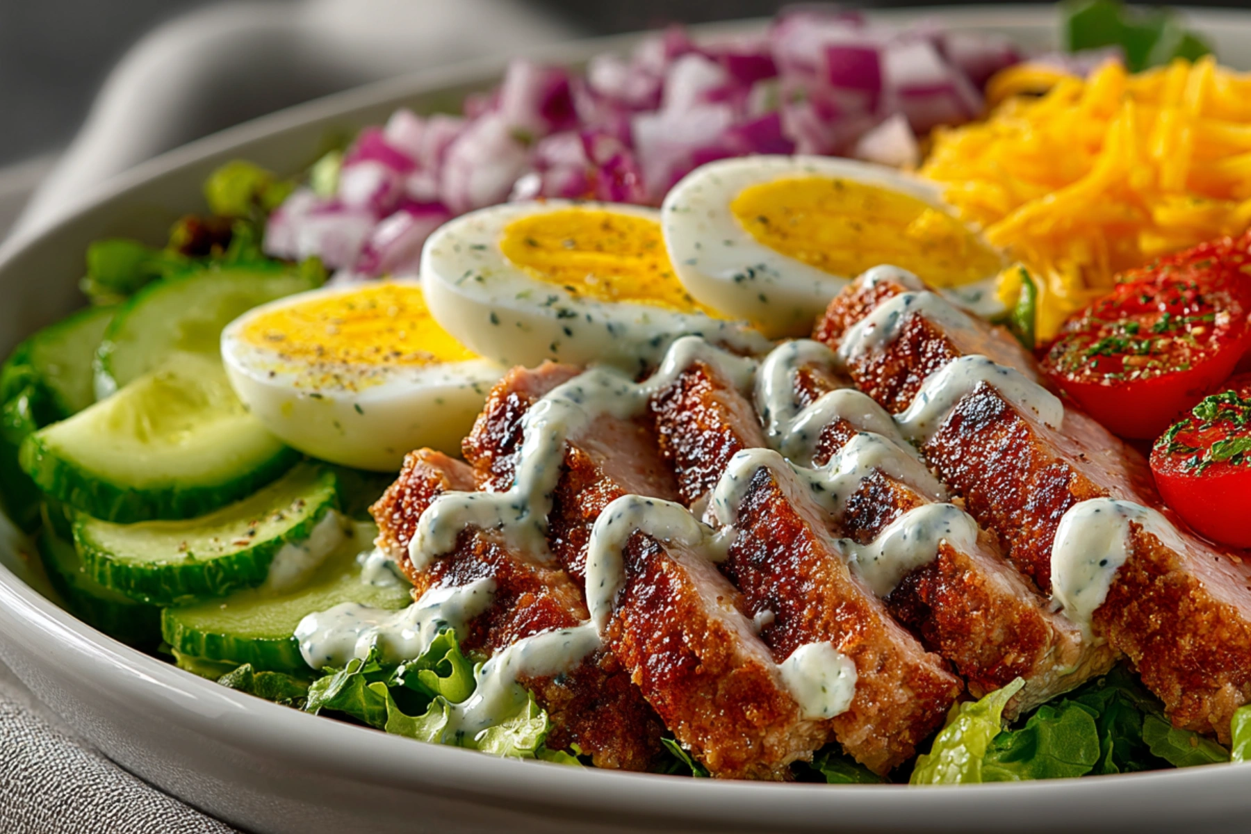 tasty Burger Cobb Salad with turkey, avocado, eggs, and vegetables