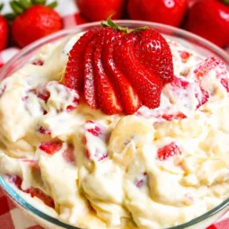 Delicious Strawberry Banana Pudding with layers of custard, strawberries, and bananas.