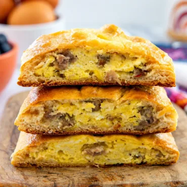 Delicious homemade breakfast hot pockets filled with eggs, cheese, and sausage.