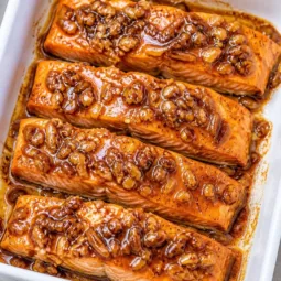 Quick Maple Pecan Glazed Salmon with toasted pecans and a sweet glaze.